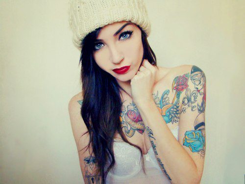 Hipster girl with tattoos
