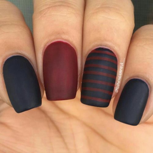 burgundy and black nail design