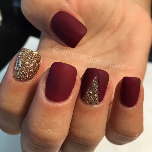 burgundy and gold nails with glitters
