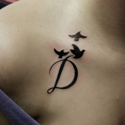 Initial tattoo d