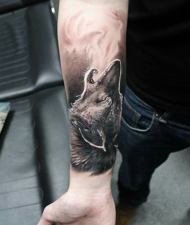 Howling wolf tattoo.